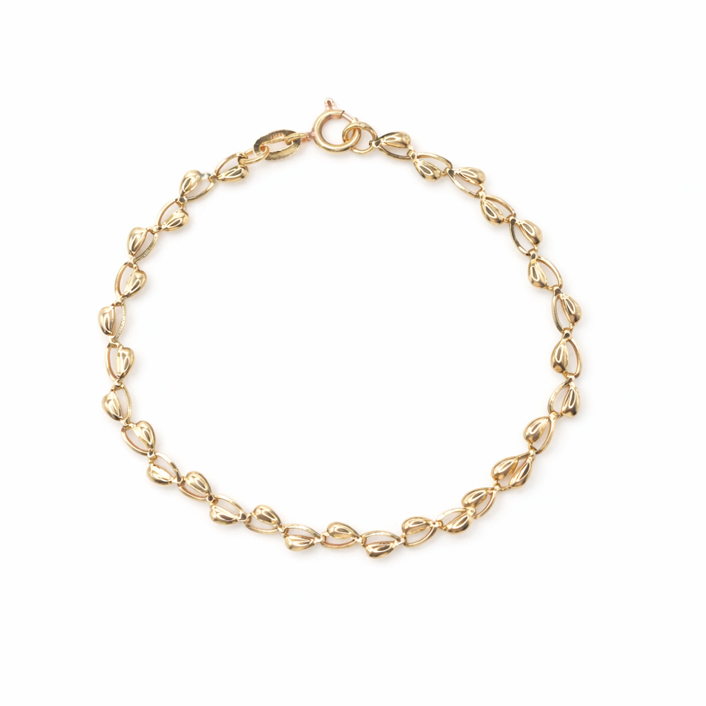 Pulsera de Oro 18K con Eslabones en Forma de Corazón y Acabado Pulido